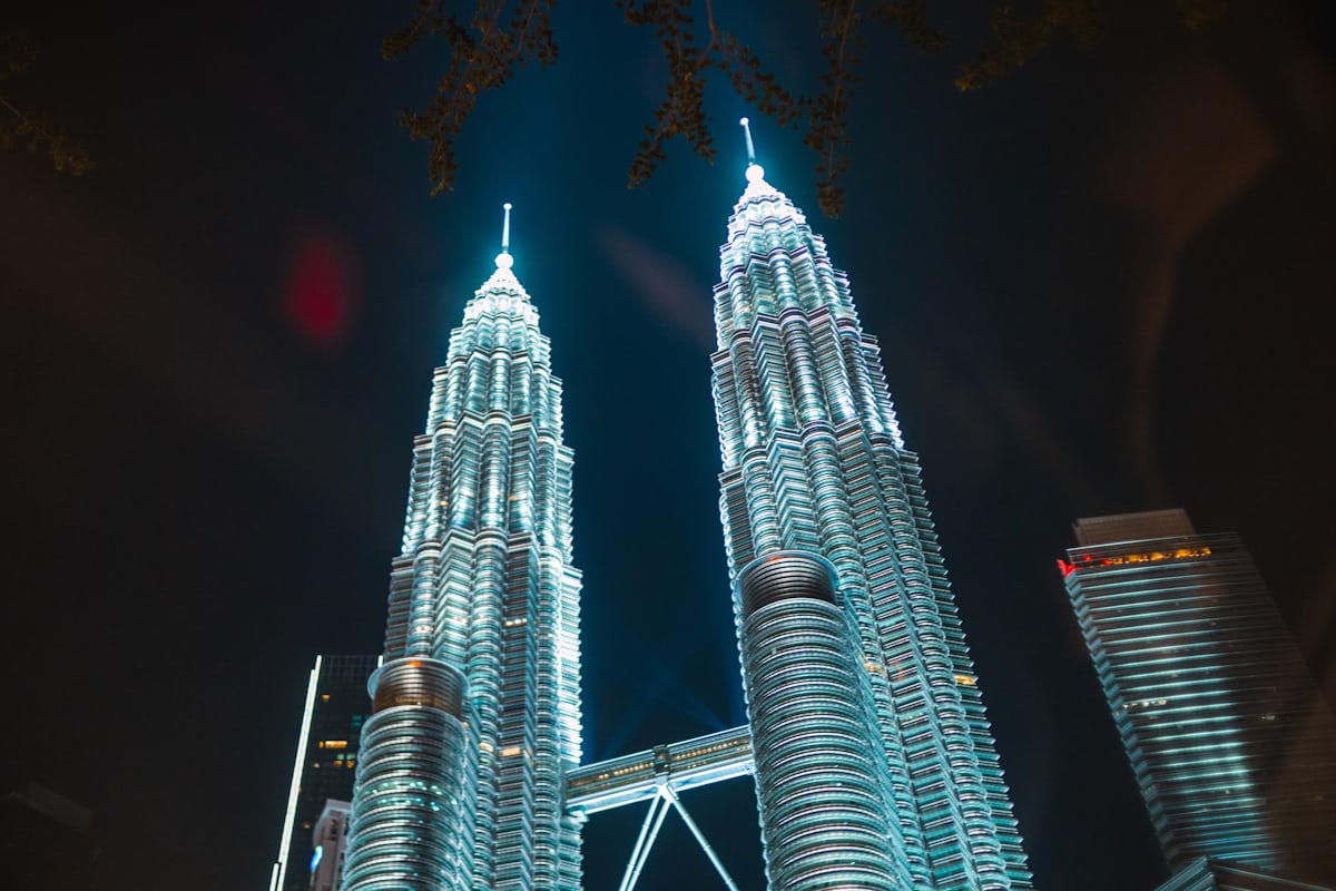 Wide-angle night view of the illuminated towers